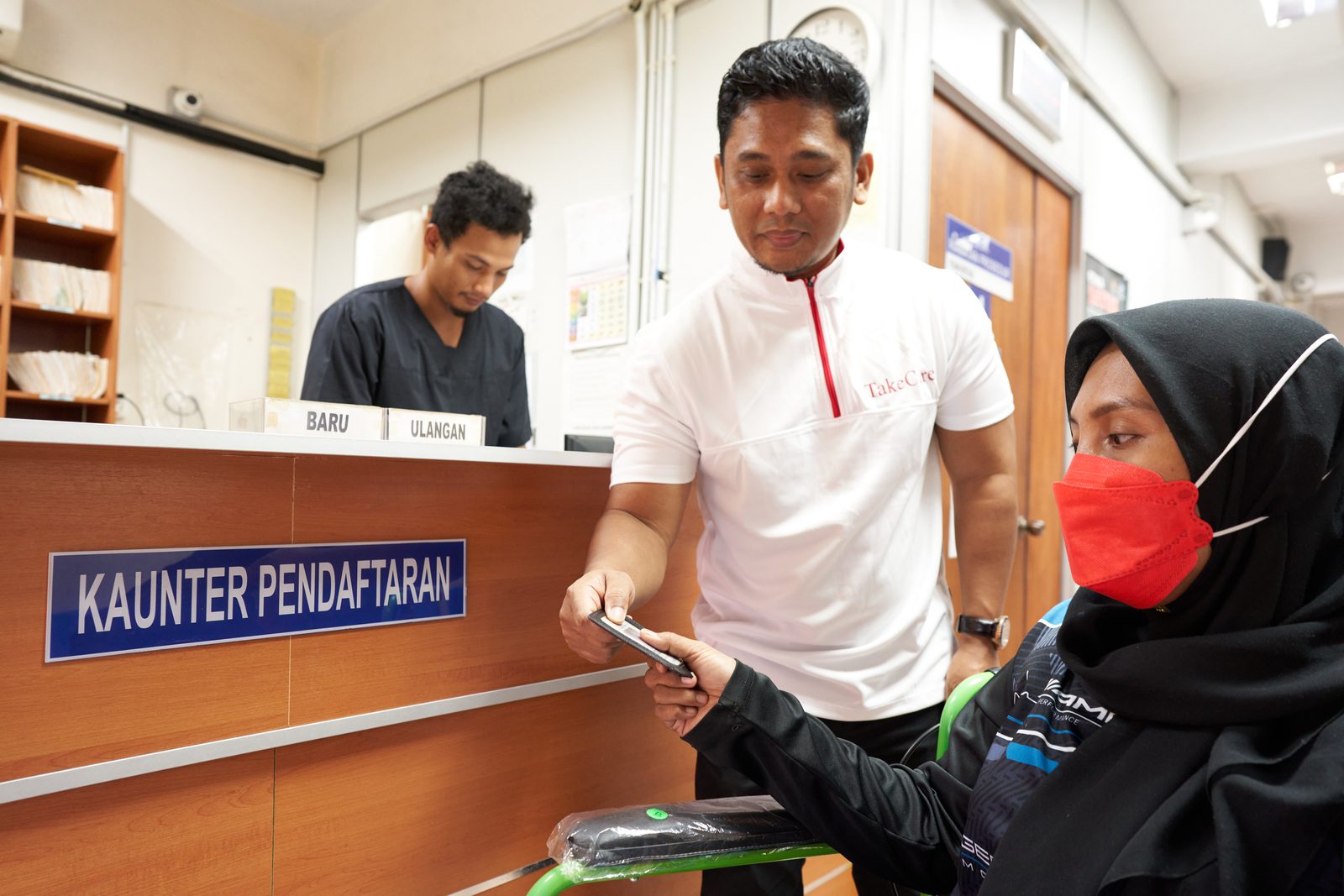 TakeCare Companion di kaunter pendaftaran